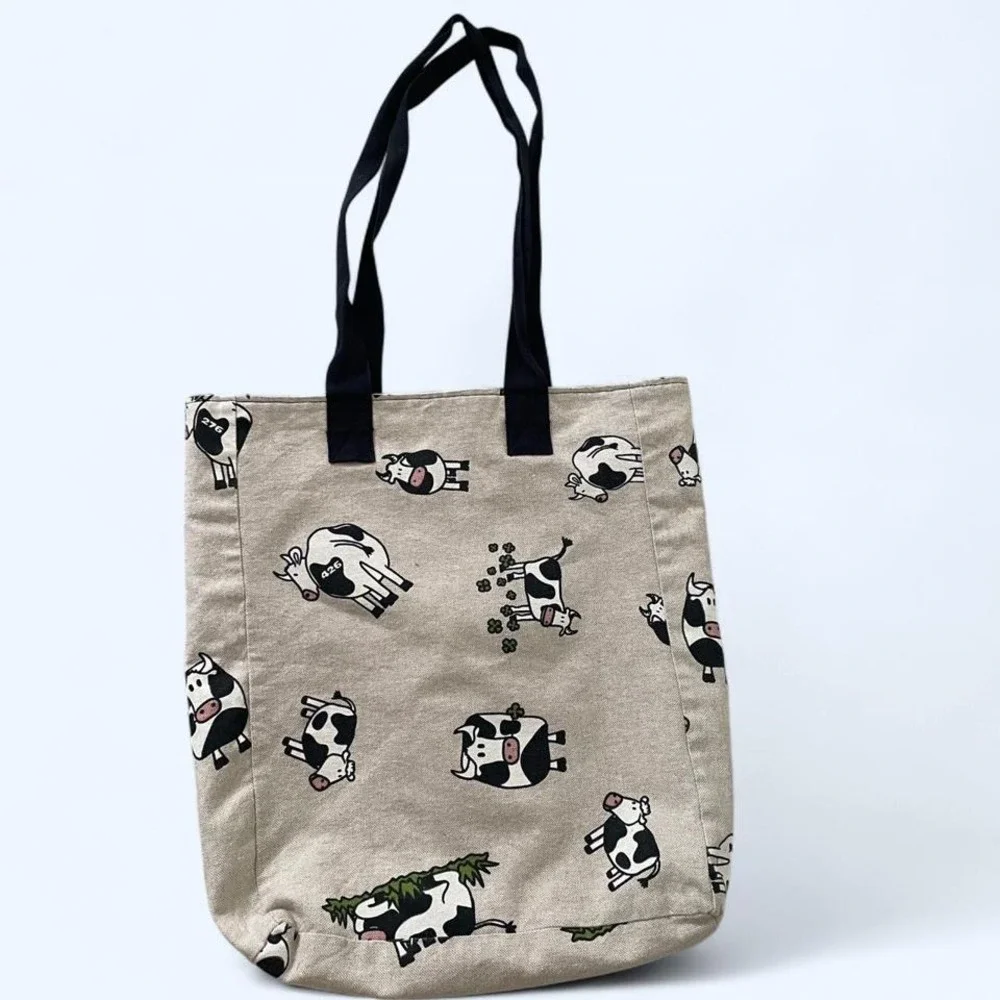 Beige canvas tote bag‎ with cartoon cow print pattern
